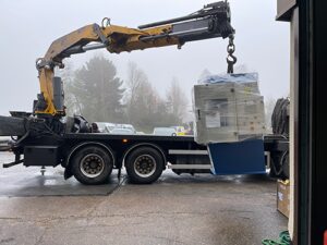 50 ton C frame press being loaded onto the back of a lorry for delivery to a customer